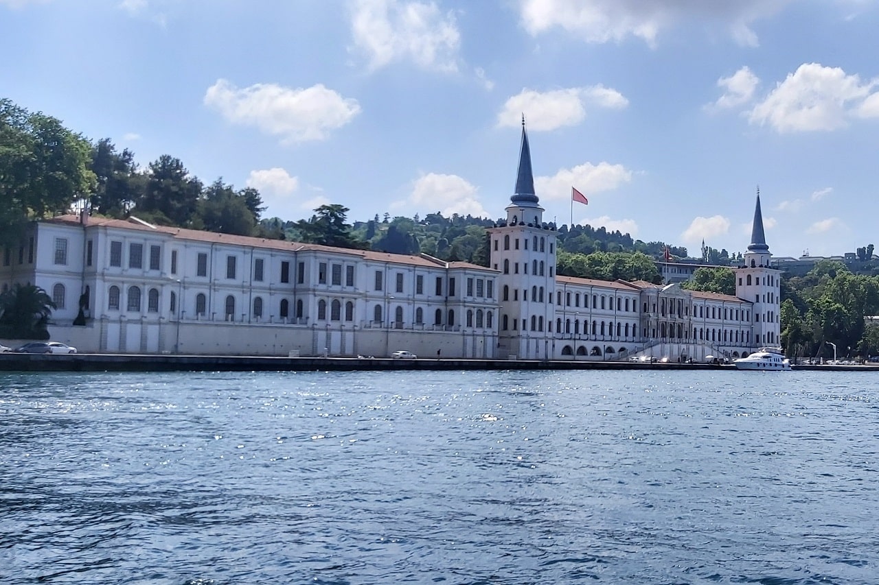 Photo of Kuleli Military High School taken from a Bosphorus cruise on a sunny day”