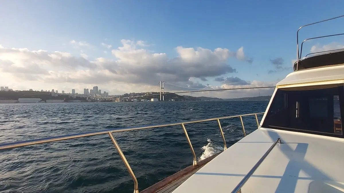 A yacht side overlooking the Bosphorus view at sunset